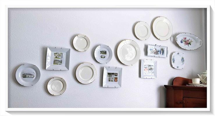 personalized dinner plates hung on the wall