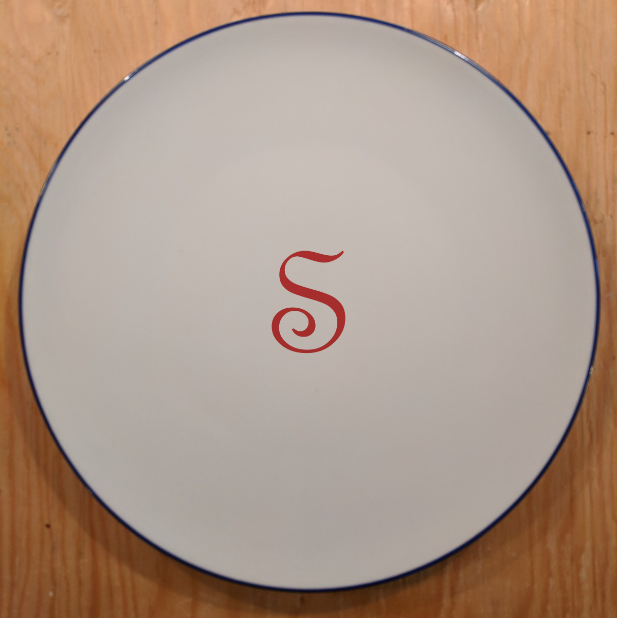 custom "S" monogram on porcelain coupe plate