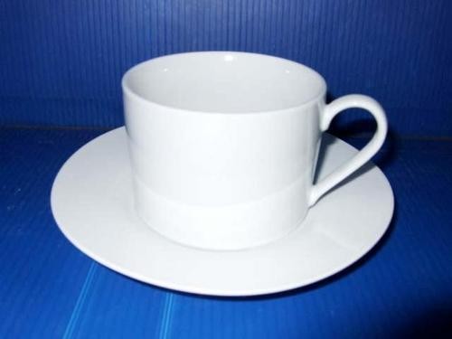 This is called "Can, Cup and Saucer" Because the cup is the shape of a can. We print your image or text on the cup and saucer