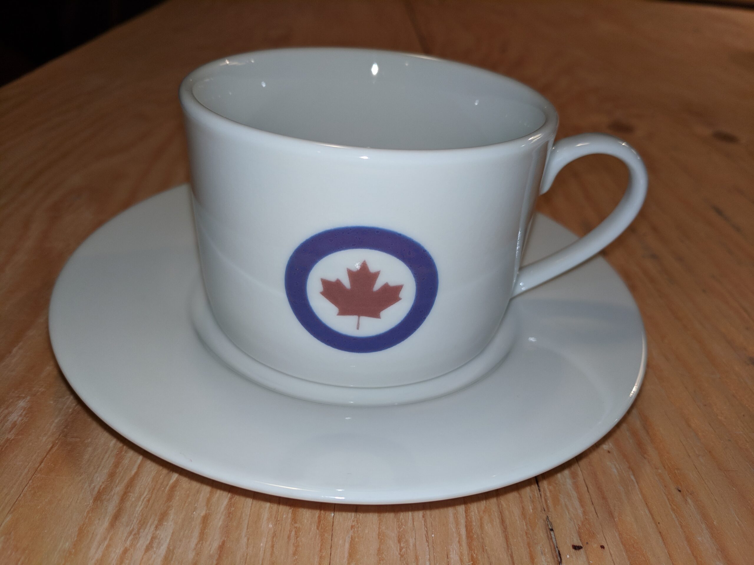 custom printed modern cups and saucers (called the can cup) these were printed for the Prime Minister in Canada with Canadian Airforce logo